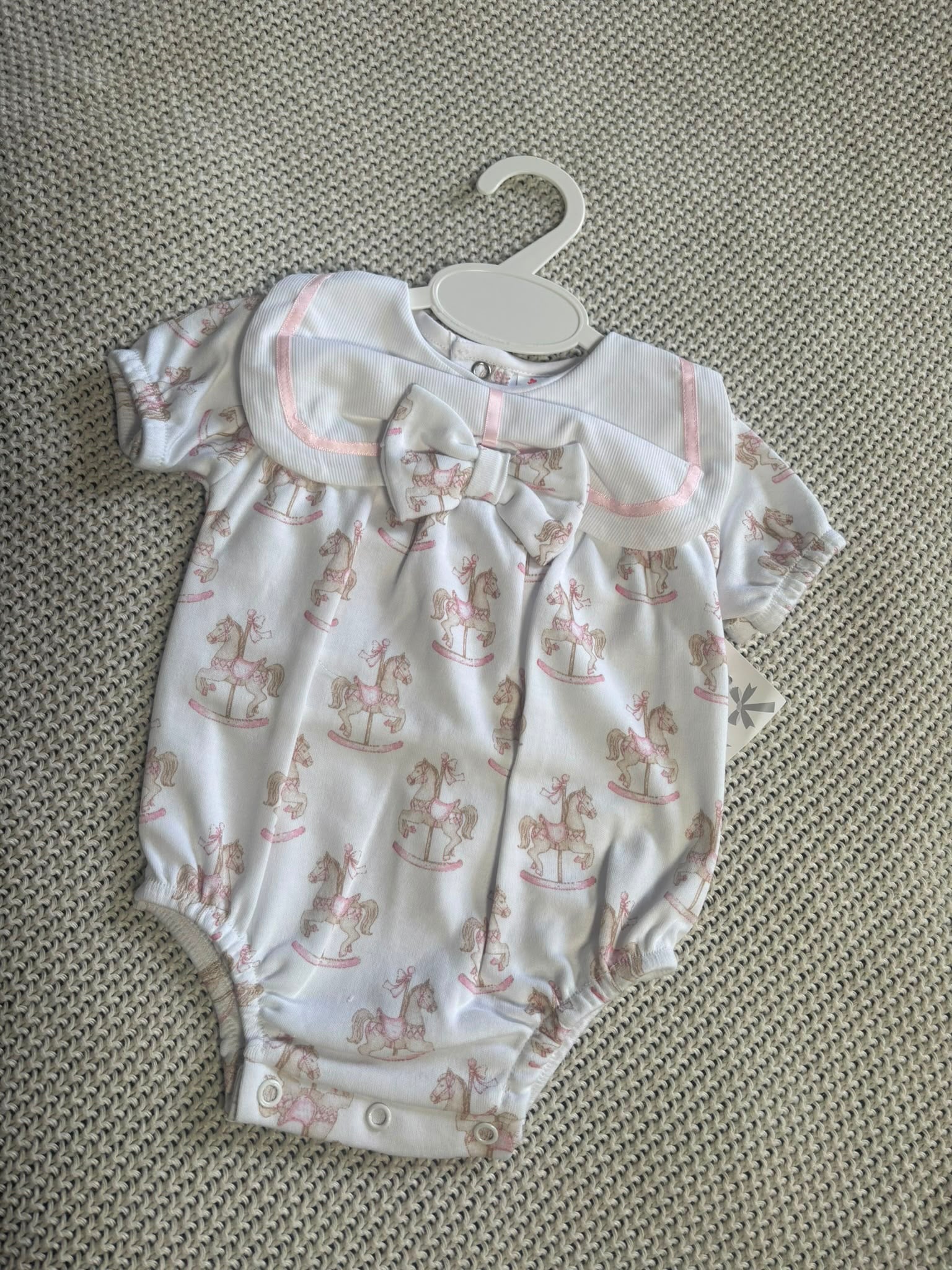 The Carousel Bow Romper